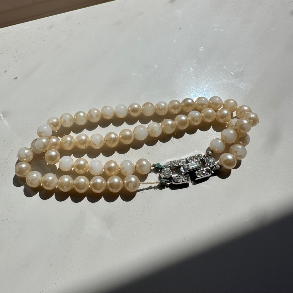 Vintage VTG Trifari double strand costume pearl bracelet with rhinestone clasp